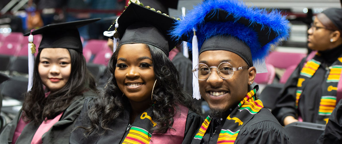 SIU graduating students pose together during the commencement